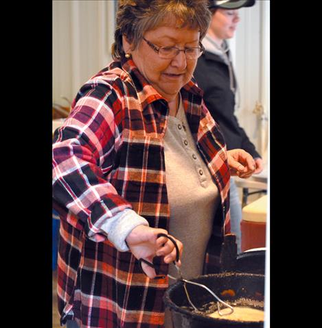 Nancy Vaughan makes frybread during the National Bison Range roundup.