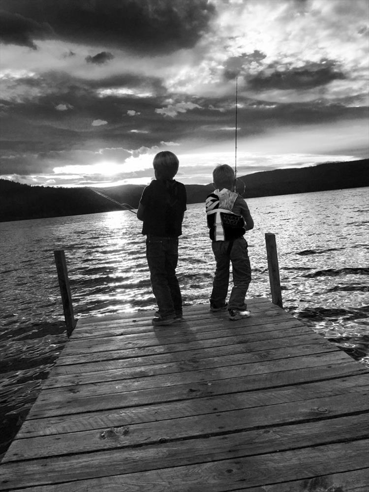 Two young fishermen recently tried their luck at sunset on a Lake Mary Ronan dock.