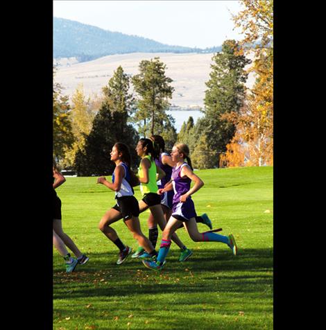 Lady Pirate sophomore Ryan Harrop races to a third place finish Saturday at the Western A Fall Classic conference championship meet in Polson.