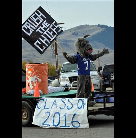 The school mascot rides in the parade.