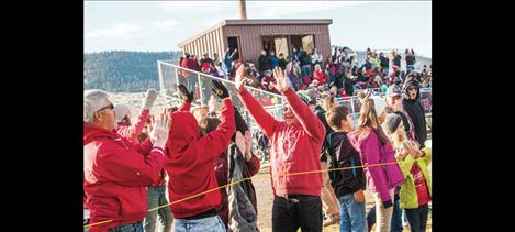 Arlee fans  celebrate as the Warriors win their quarterfinal game to advance to semi-final play. The game will be played in Arlee at  1 p.m. Saturday, Nov. 14, where the winner will play for the State Championship.