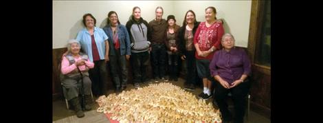 Tribal artisans were honored at a dinner party at Allentown Restaurant Thursday, Nov. 5, for their efforts in hand making close to 300 beaded moccasins for Head Start children to wear in the Head Start powwow and other cultural activities throughout the year. Artisans include, from left, Eva Boyd, Evelyn Joseph, Arleen Adams, Shiloh McDonald, (hide tanners- Randall Michelle, wife) Ruth Swaney, Geri McDonald and Mary Jane Charlo. Also contributing but not pictured are Naomi Robinson and Kay McLeod.