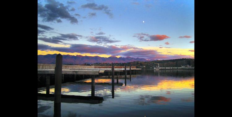 The rest of the world's piers would be pressured to come up with a more beautiful view than the purple and orange hues of sunset reflected in the lake at Salish Point pier.