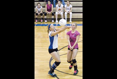 Players from Bigfork, Hot Springs, Ronan and Charlo watch as Mission’s Stephanie Lewandowski hustles to the ball just ahead of Polson Lady Pirate Mackenzie Banner.