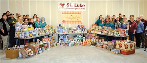 St. Luke Community Healthcare employees that gathered the most canned goods, above, will be treated to a pizza party. In all, employees collected 3,035 pounds of non-perishable food to donate to food banks across Lake County.