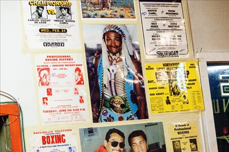 A “wall of fame” hangs in the co-op, boasting photos of Marvin Camel’s accomplishments. Camel was a two-time world champion boxer.