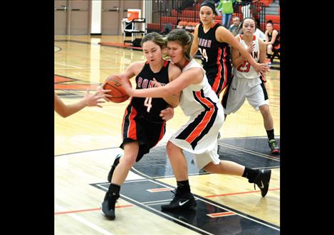 Maidens Jordan Clairmont and Ashley Peterson compete in Friday’s Orange and Black Scrimmage.