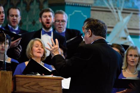 The Treasure State Chorale sings to help save the murals.