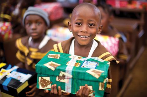 Liberian children receive shoebox gifts through Operation Christmas Child.