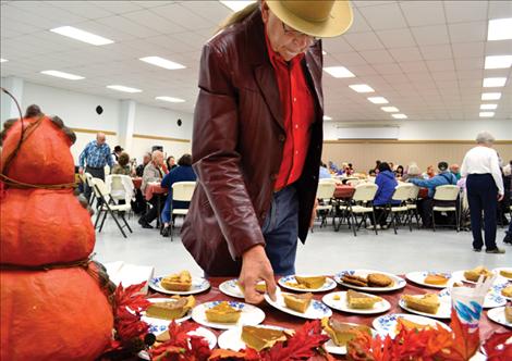 Bear Adams joins his wife and more than 400 other guests at the annual Ronan Community Thanksgiving Dinner. 