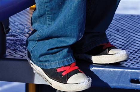 While wearing the glasses, Jace notices his red shoelaces are “really bright.”