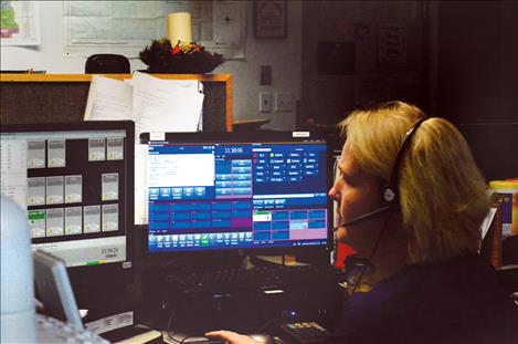 Staycha Hanson, a 911 dispatcher, is part of the team that sometimes receives about 300 calls per day.
