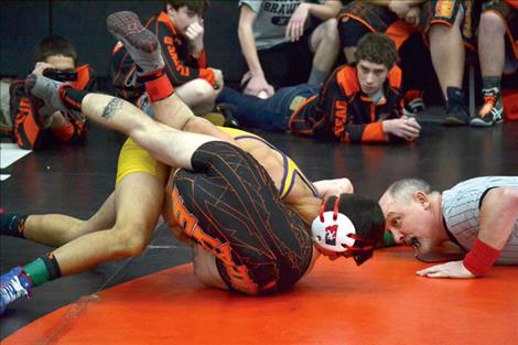 Bridger Wenzel of Polson pins Cody Moats of Flathead JV in :48 seconds.