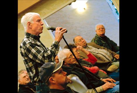 Rancher Mac Binger questions Reserved Water Rights Compact Commission attorney Jay Weiner about call amounts on a pump or irrigation.