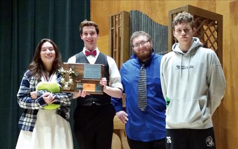 Jessie Lewis, Ryan Dresen, Eli Carey and Kail Cheff hold Ronan’s second place trophy won Saturday at the Speech and Debate divisional tournament in Missoula.