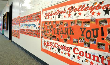 Posters line the school hallways, thanking groups for volunteering to read.