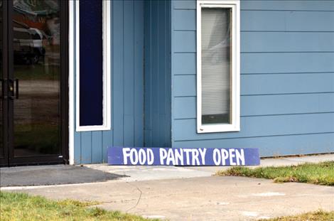 The new location for the Food Pantry, a block behind the Hangin Art Gallery, is more easily monitored.