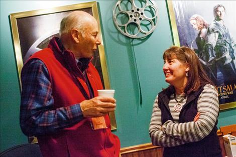Polson filmaker Chuck Jarecki visits with Becky Dupuis of Showboat Cinemas.