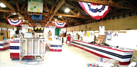 Prior to remodeling, the horticulture barn has open beams and walls that are not insulated.