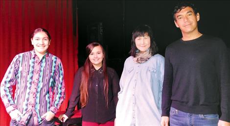 Ronan students Marlon Starblanket and Kiana Brown, left, read alongside accomplished Native authors dg nanouk okpik and Matthew Haynes during the Open Country Reading Series held in Missoula Jan. 30.