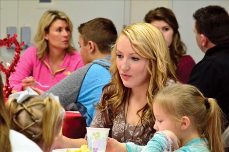 Skyler Frame of Charlo sits with her family during the ceremony to celebrate local student achievment. 