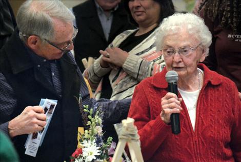 John Schnase, former director of the Boys and Girls Club, stands with his mother, Katherine. The family was honored for their committment to the local club.