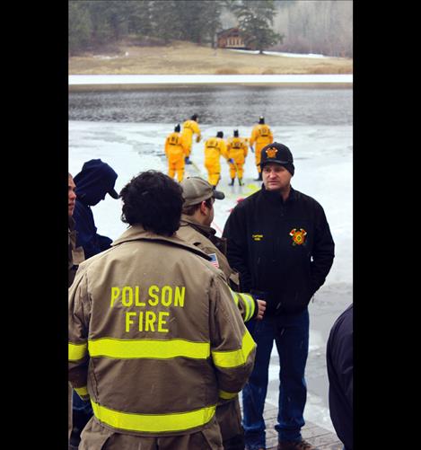 Firefighter Captain Drew Hoel, right, leads collaborative training between Polson Rural Fire and Lake County Search and Rescue teams.