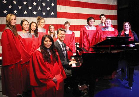 The Arlee High School choir, pictured with composer and producer Tim Janis, will be on PBS Montana Monday, March 7, at 7 p.m. as part of the “Celebrate America Across Montana” special.