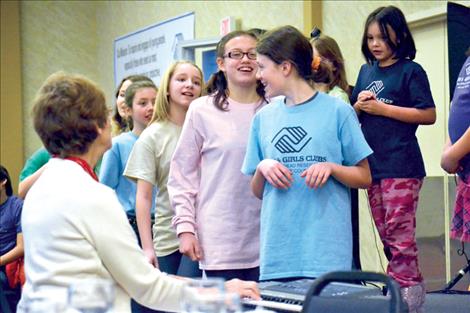 Youth in the MIssion Valley Chilldren’s Choir perform at a fundraiser for the Boys and Girls Club.