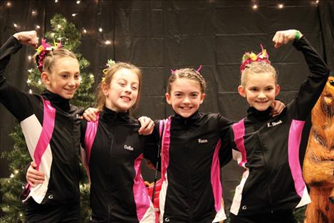 Polson  gymnasts heading to state  competition this weekend in Kalispell include, from left, Madison Straub, Shalayne Ostler, Layla Reese and Kendall Straub. 