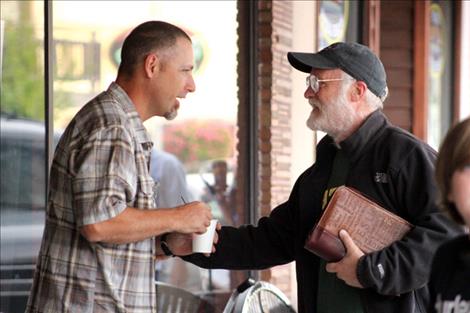 Folks greet each other Sunday morning outside Fresh Life Church on Main Street in Polson.