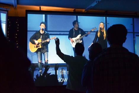 People at Fresh Life Church worship during services simulcast throughout the northwest.
