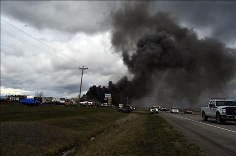 Smoke blew  over  the  highway from the  S&S Sports  fire.