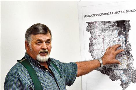 Chairman Tim Orr explains the location of the different districts encompassing the Flathead Joint Board of Control during the meeting. 