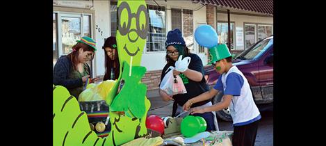 Library patrons decorate their parade float.  