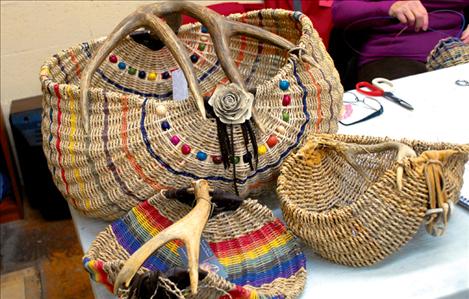 Brigitte Miller’s baskets brighten up the back room of the Sandpiper Art Gallery during the art walk. Miller was demonstrating her basketry, and she also teaches classes.