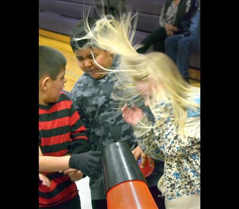 Students explore the Bernoulli Blower.