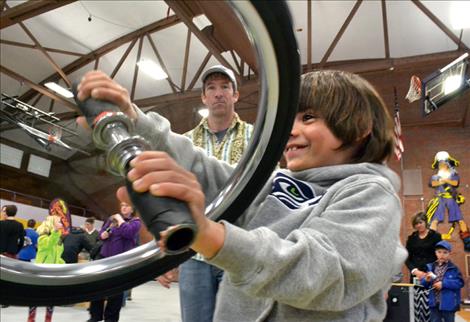 A gyroscope moves second-grader Remy Maaliki.