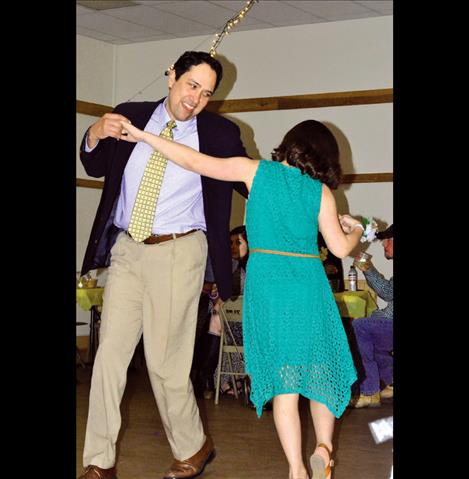 Mike Christensen and his daughter, Alli Christensen, 11, dance during the Father Daughter Dance. 