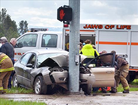 A speeding driver lost control and slammed his car into a traffic signal in Pablo Wednesday, April 13, causing serious injury to himself and his female passenger.