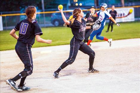 Lady Pirate Shortstop Kaelyn Smith fires toward first base for the out.