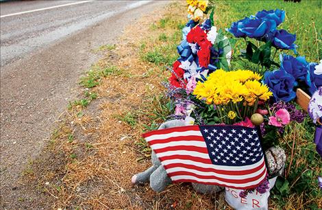A memorial in honor of Roger Bordeaux sits along Highway 93 in Polson.
