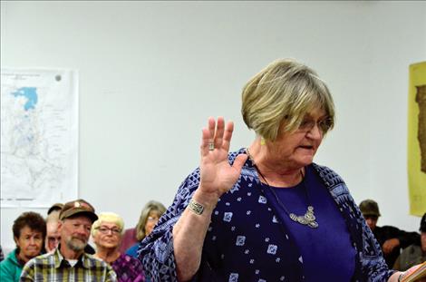 Janette Rosman is sworn in during the Flathead District meeting