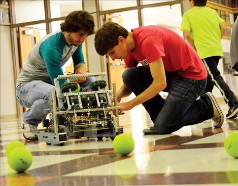 Ronan students Ryan Talsma and Andrew Koehler set up their robot.