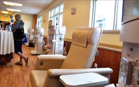 A dialysis station includes a heated recliner, a wall-mounted television and Internet access.