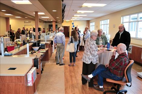 Visitors tour the Fresenius Medical Care facility in Polson. 