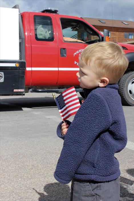 Walter Mihara watches the Memorial Day Parade in Polson.