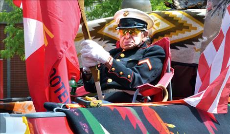 Francis Stanger, U.S. Marine Corps, rides in the Ronan Memorial Day Parade.