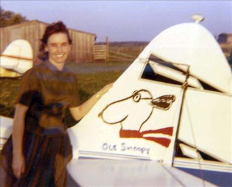 A photo from the 1960s shows Lorene next to the tail of her Piper. Granddaughter Melissa Coleman of Charlo provided the photograph.