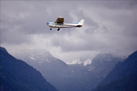 Lorene Pollock flies up and away on surprise birthday flight.